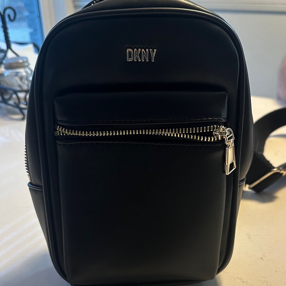 DKNY Men's Black Backpack with Silver Accents